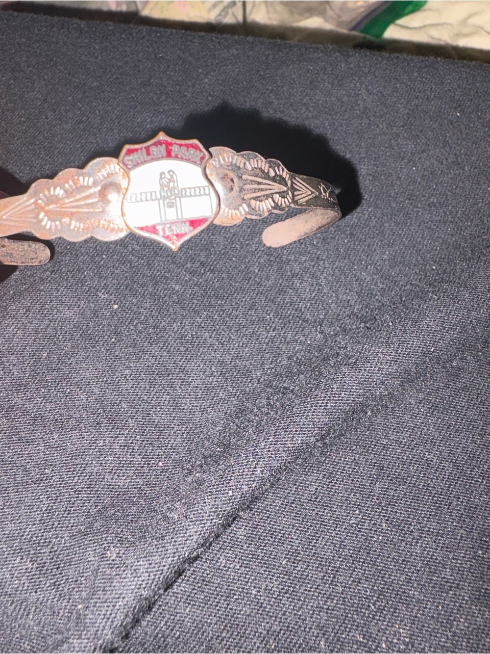 Vintage Silver-Tone Shield Cuff Bracelet with Red Enamel Accent